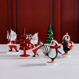 Festive Four Santa & Penguin Figurines, Set of 4, Holiday Decoration, 7" Tall