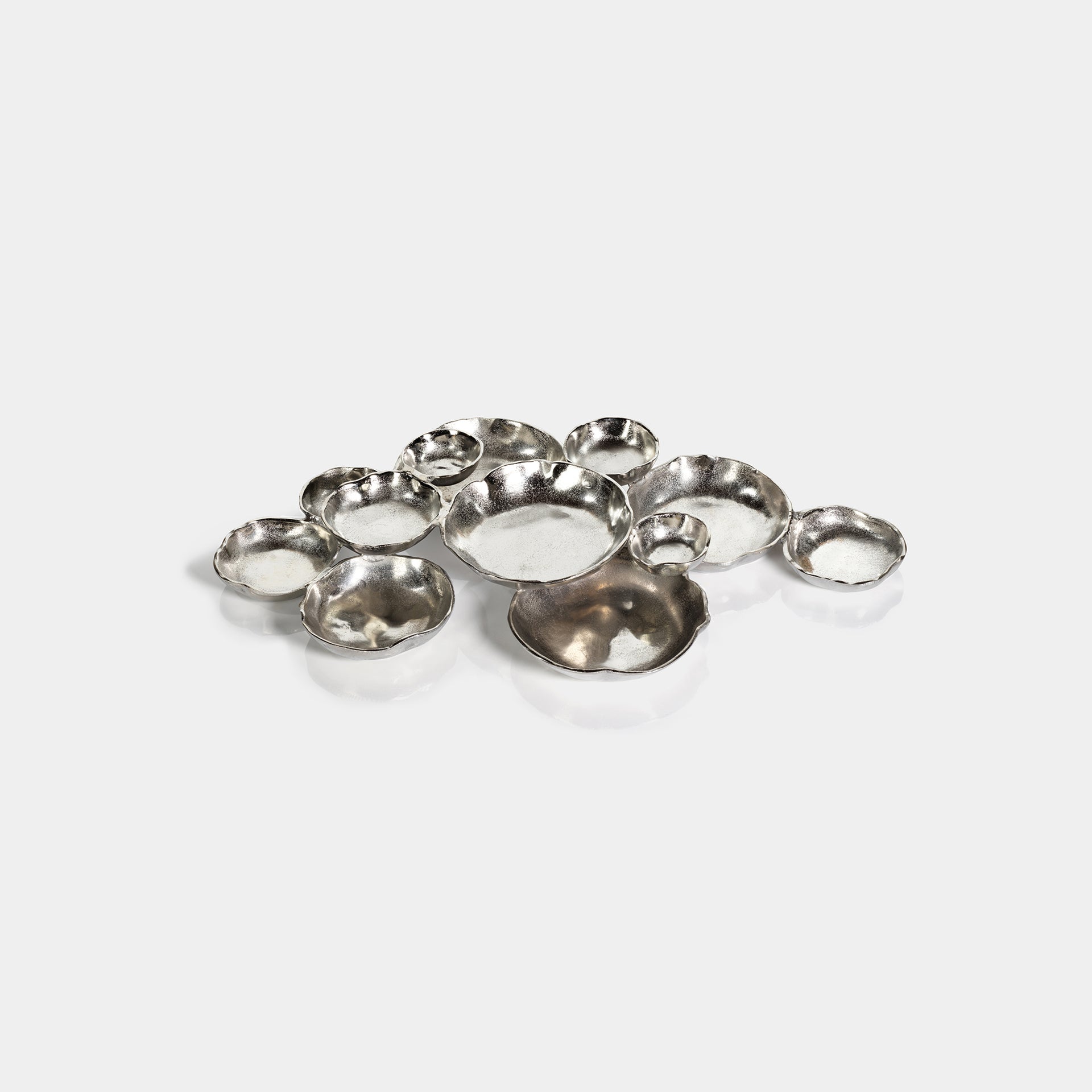 Cluster of Twelve Round Silver Serving Bowls