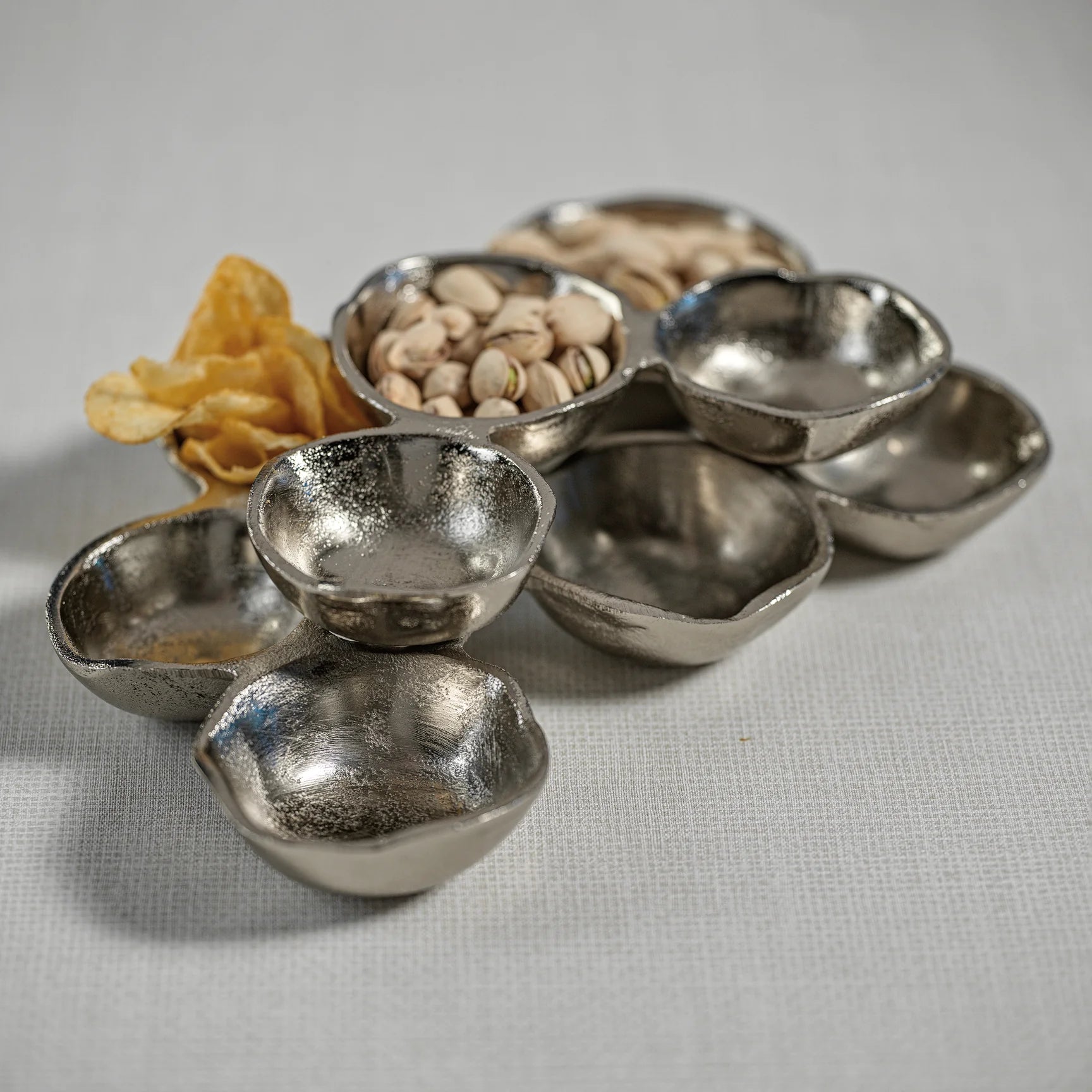Small Cluster of Nine Serving Bowls in Nickel