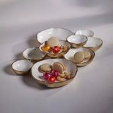 Cluster of Nine Round Serving Bowls in Gold and White